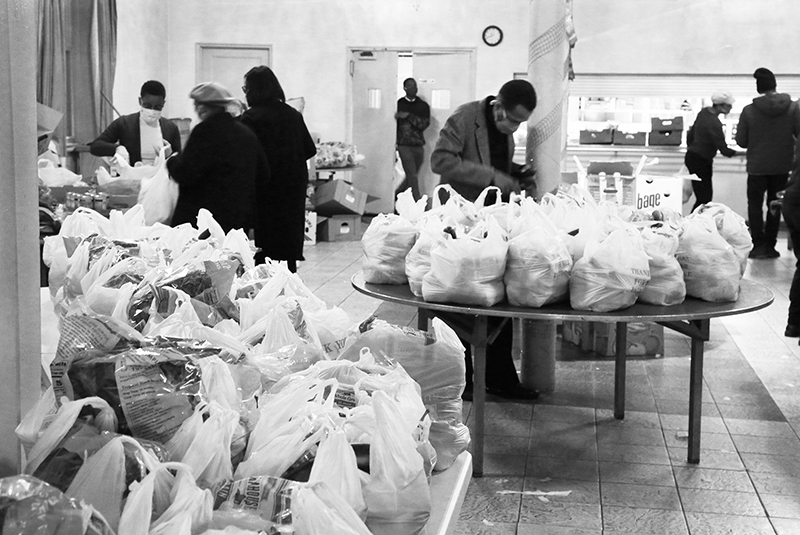 2020 : Food Lines : Seventh Day Adventists Help the Needy : Streetlife : New York City : Times Square : Richard Moore : Photographer : Photojournalist